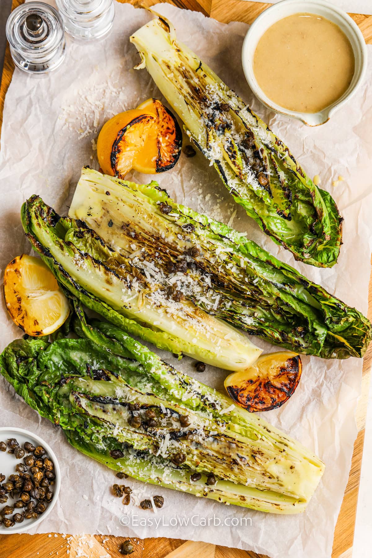 grilled romaine salad on a cutting board
