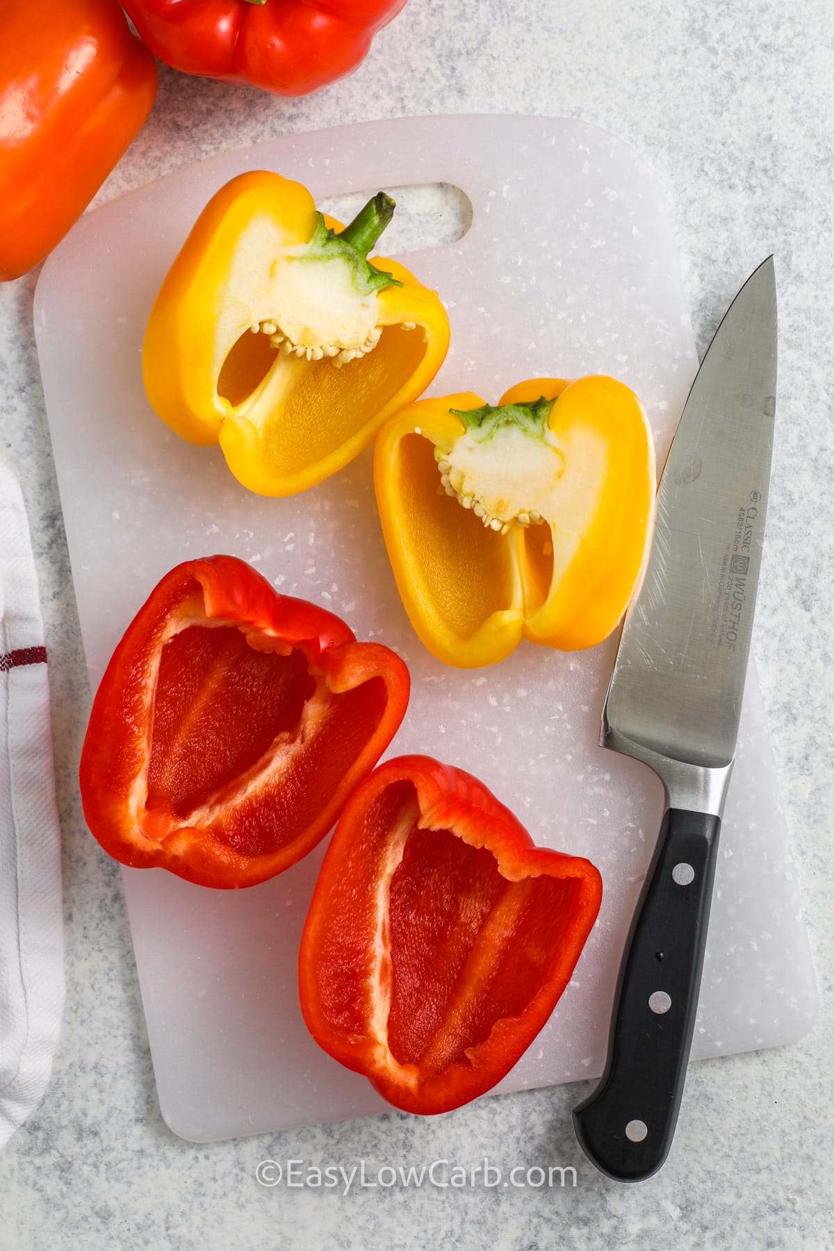 slicing peppers to make Ground Turkey Stuffed Peppers