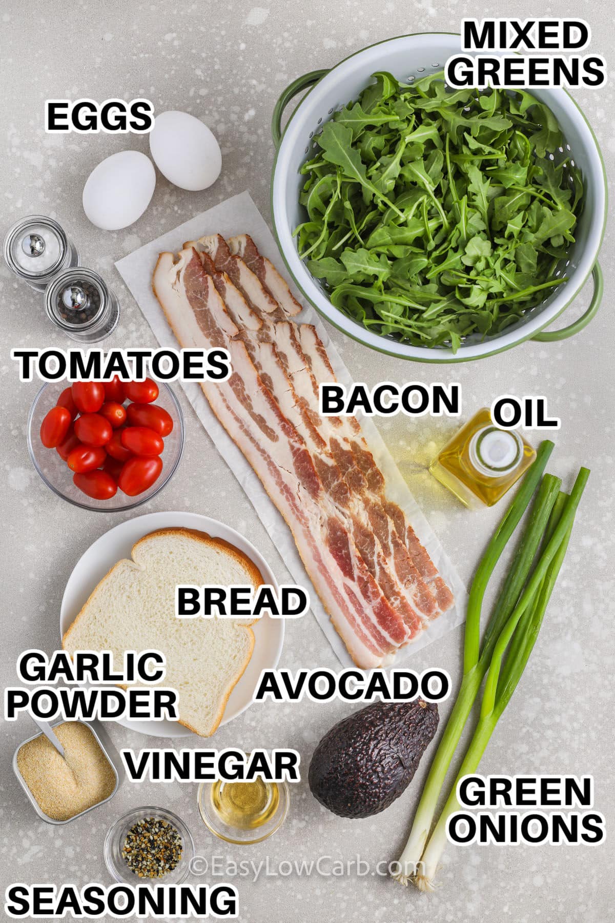 mixed greens , bacon , eggs , oil , tomatoes , bread , garlic powder , avocado , vinegar , seasoning , green onions with labels to make Breakfast Salad