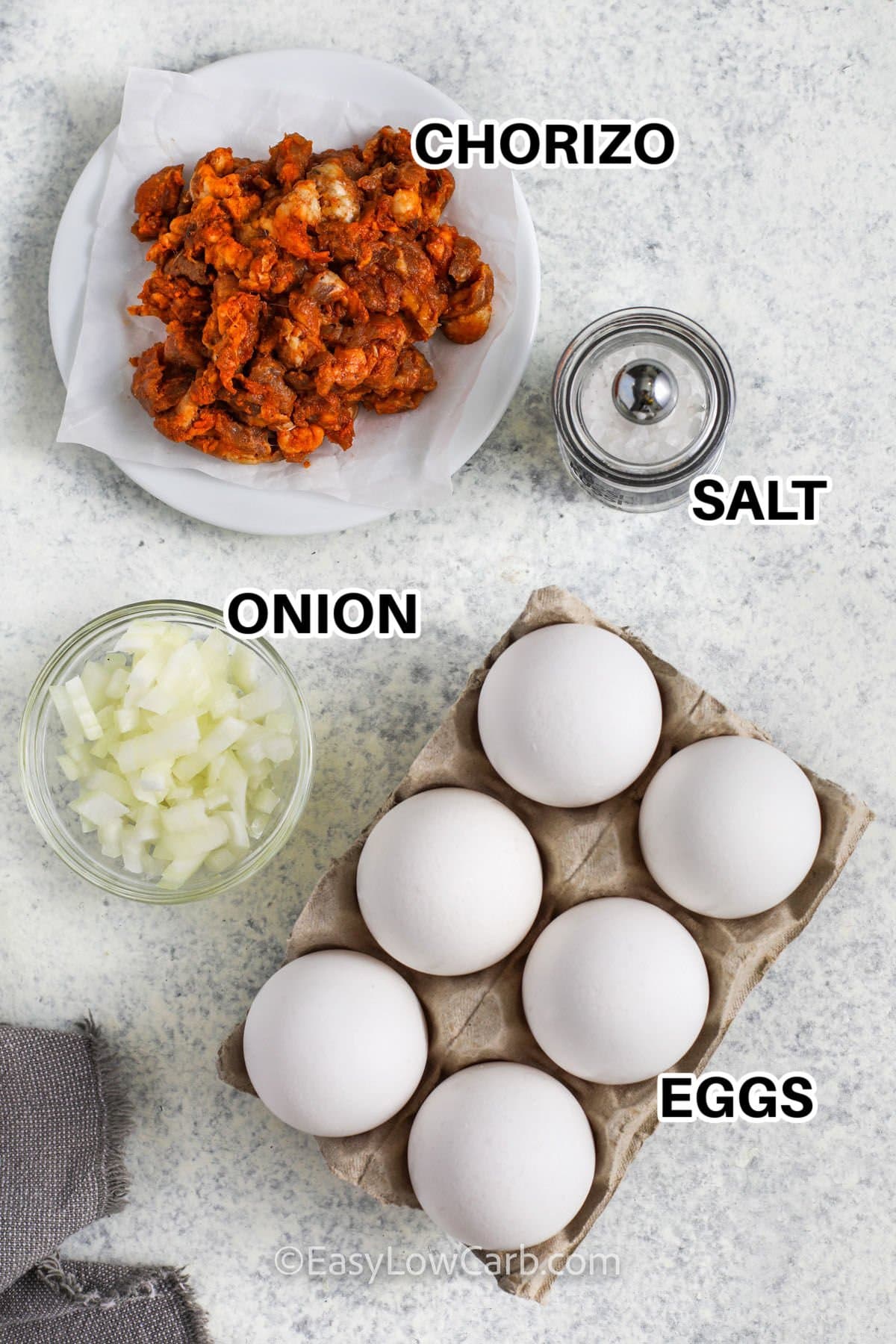 chorizo , onion , salt and eggs with labels to make Chorizo and Eggs Recipe