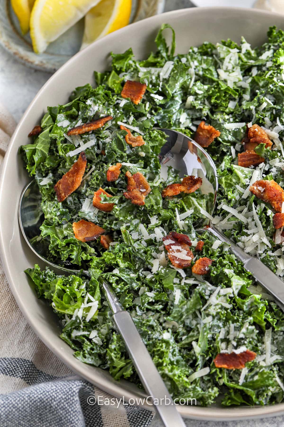 bowl of Kale Caesar Salad with spoons