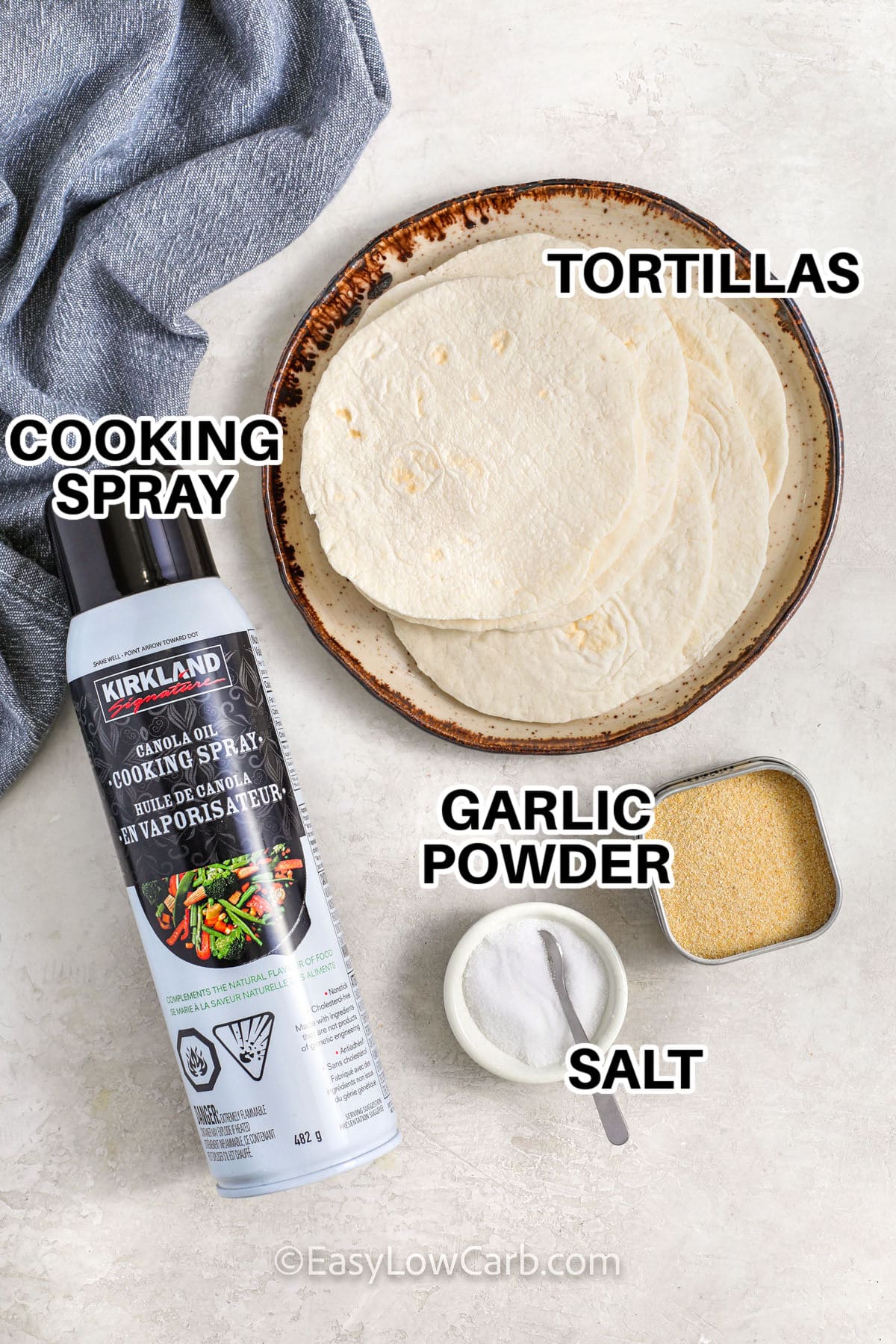 tortillas , cooking spray , garlic powder and salt with labels to make Low Carb Tortilla Chips