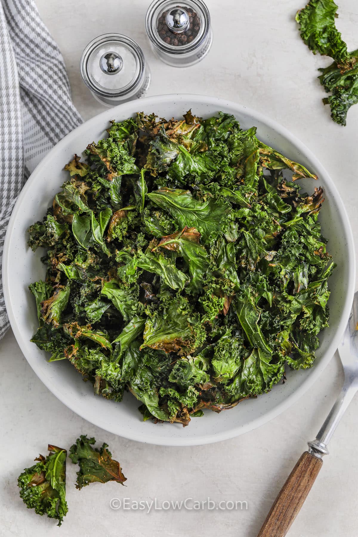 Roasted Kale in a bowl with a spoon