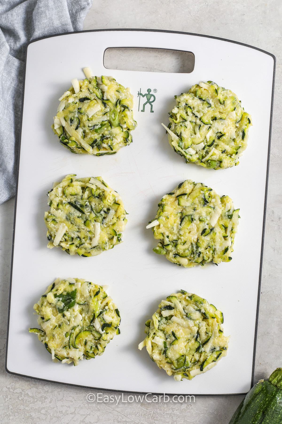 zucchini fritters prepared on a cutting board