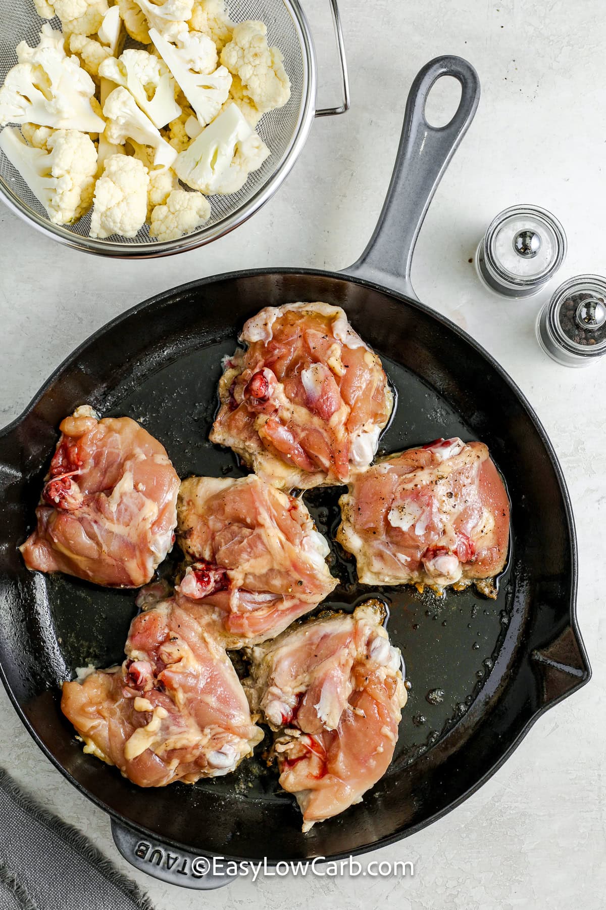 chicken thighs in a pan