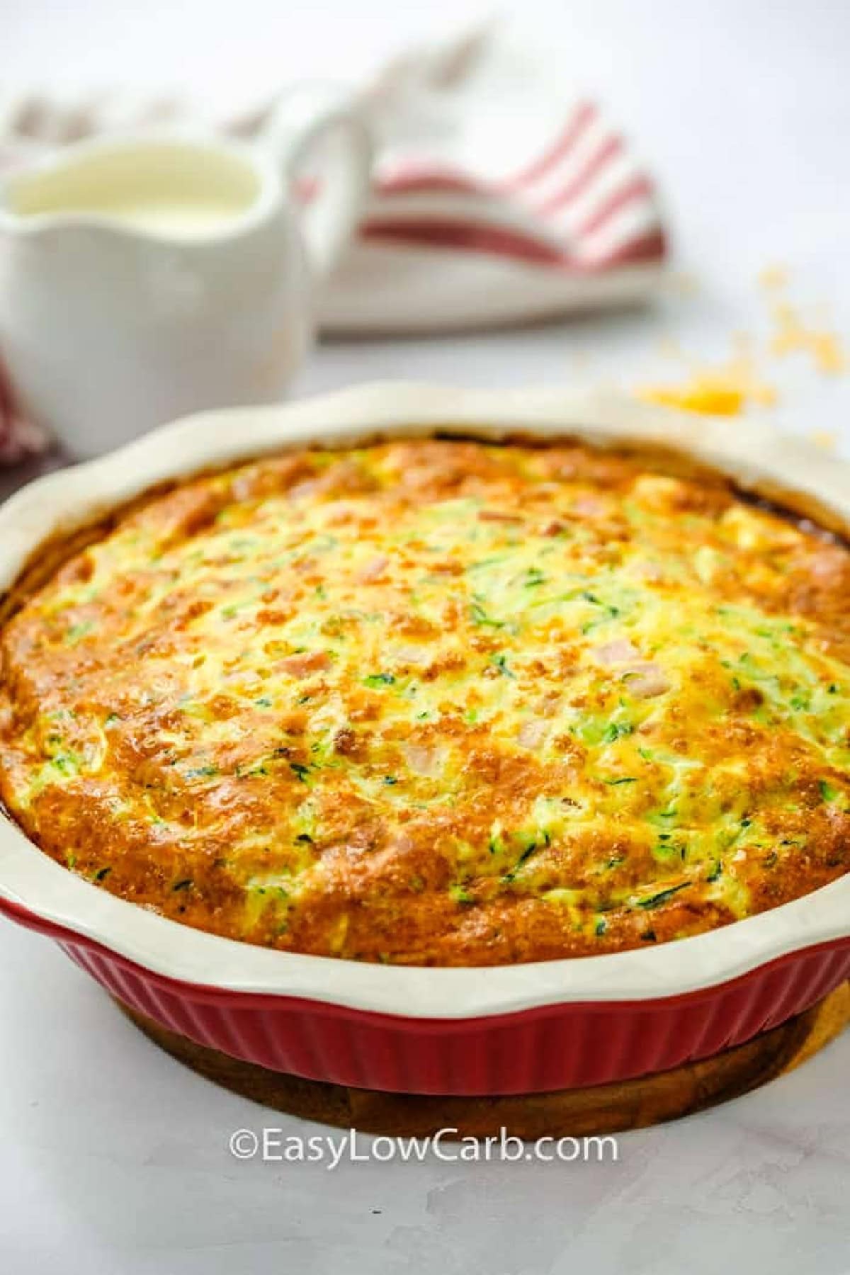 cooked Crustless Ham and Cheese Quiche in a baking dish