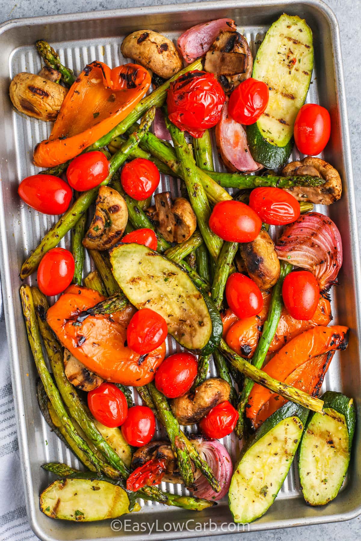 grilled vegetables on a sheet pan to make Grilled Vegetable Salad