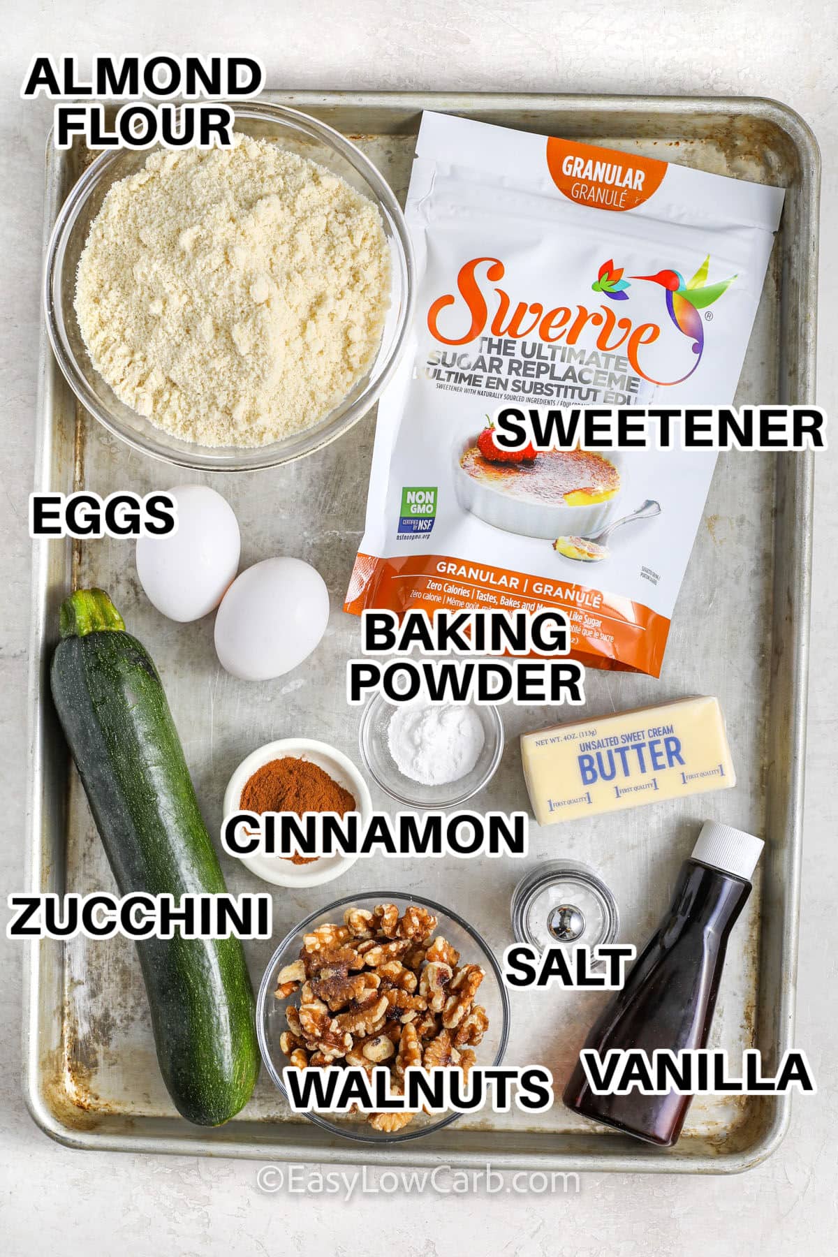 almond flour , sweetener , eggs , baking powder , cinnamon , zucchini , salt and vanilla with labels to make Keto Zucchini Bread