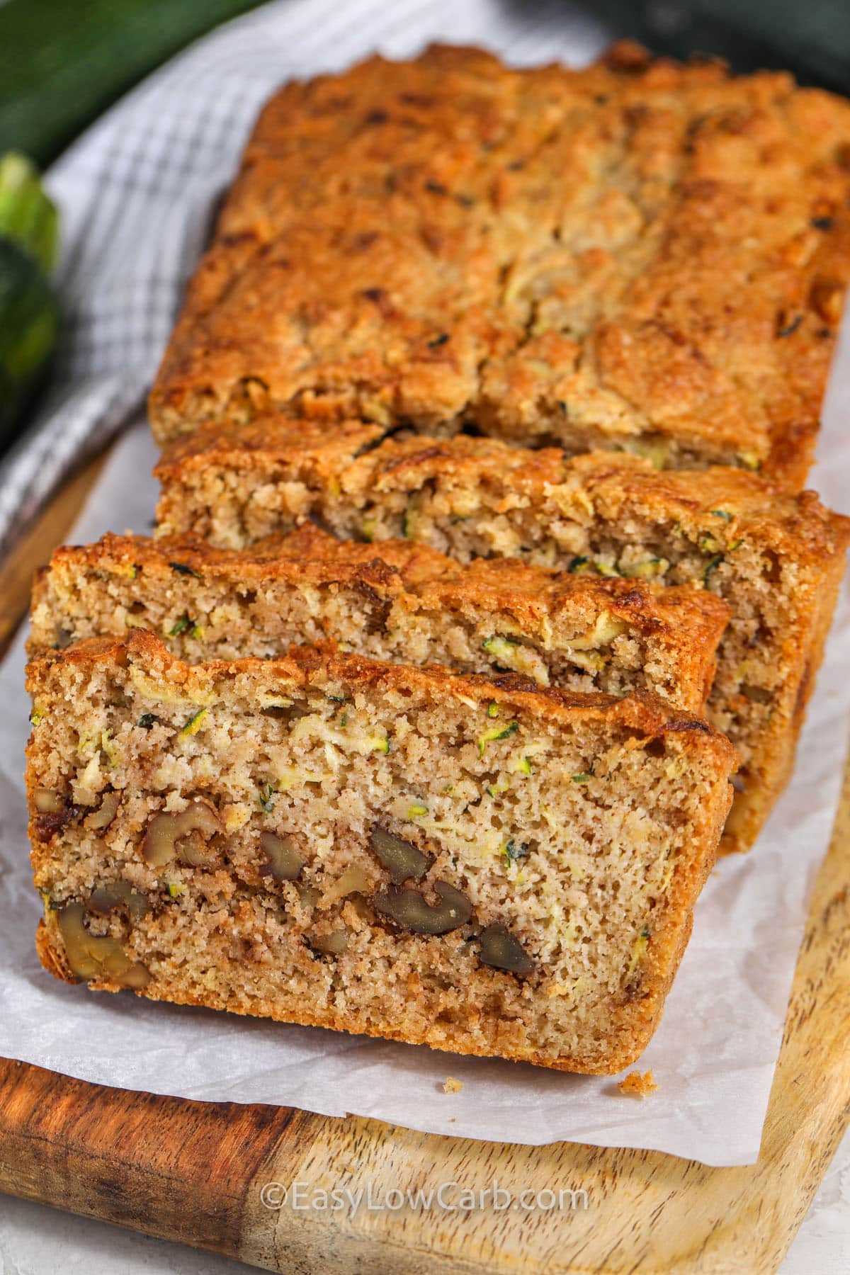 slices of Keto Zucchini Bread on a wooden board