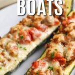Two stuffed zucchini boats on a plate with a title