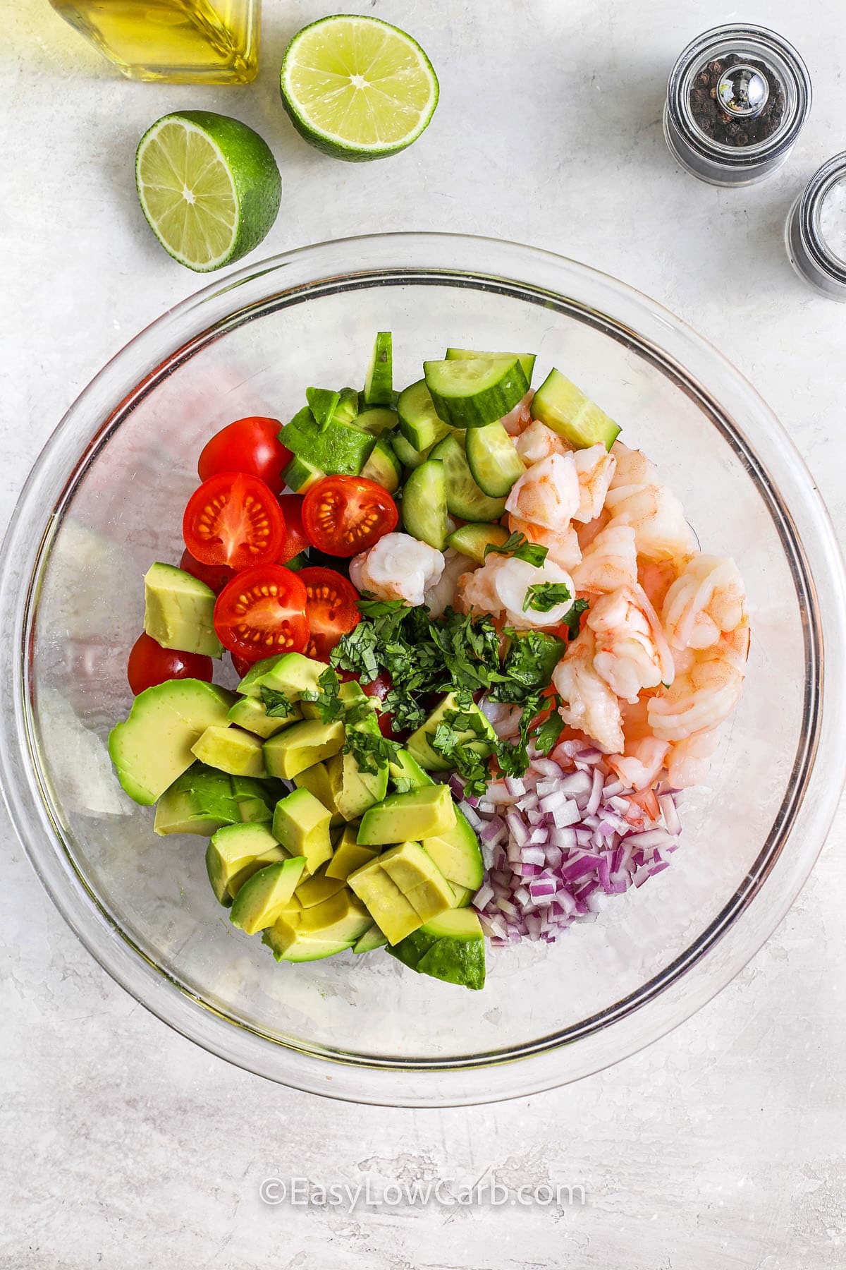 ingredients in a bowl to make Shrimp Avocado Salad