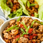 bowl of Chicken Lettuce Wrap Recipe filling with lettuce wraps in the back