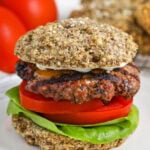 Keto Hamburger Buns with a hamburger , lettuce and tomato