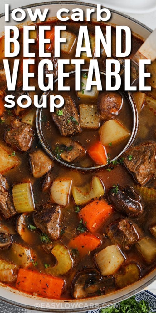 pot full of Homemade Vegetable Beef Soup with writing