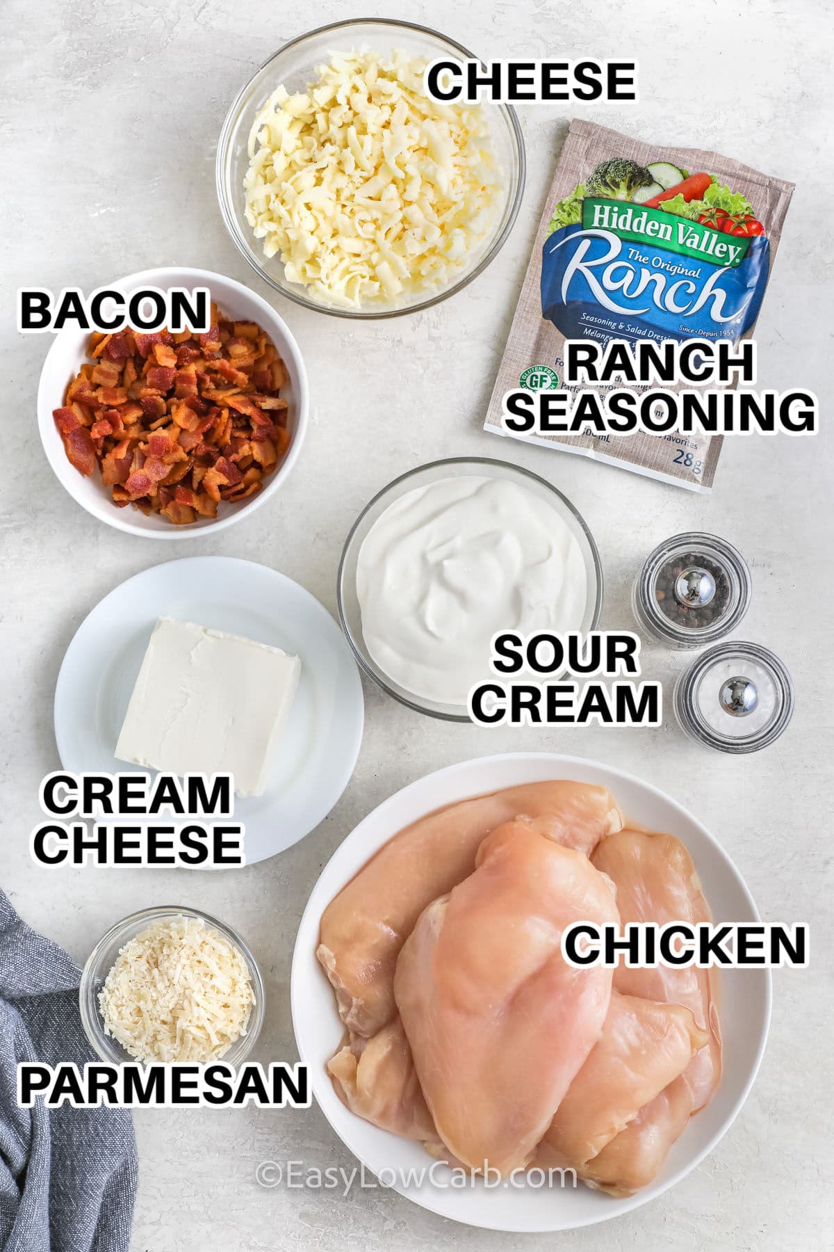 cheese , bacon , ranch seasoning , sour cream , cream cheese , parmesan , chicken , salt and pepper with labels to make Baked Ranch Chicken