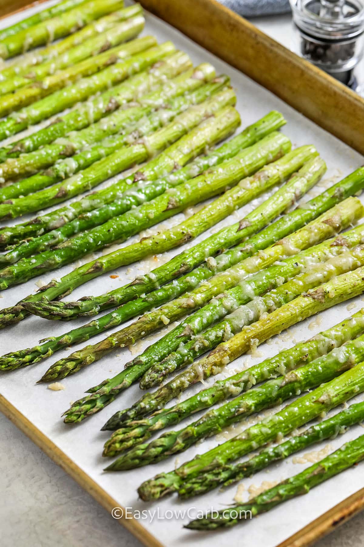 close up of Parmesan Asparagus on a sheet pan cooked on a sheet pan