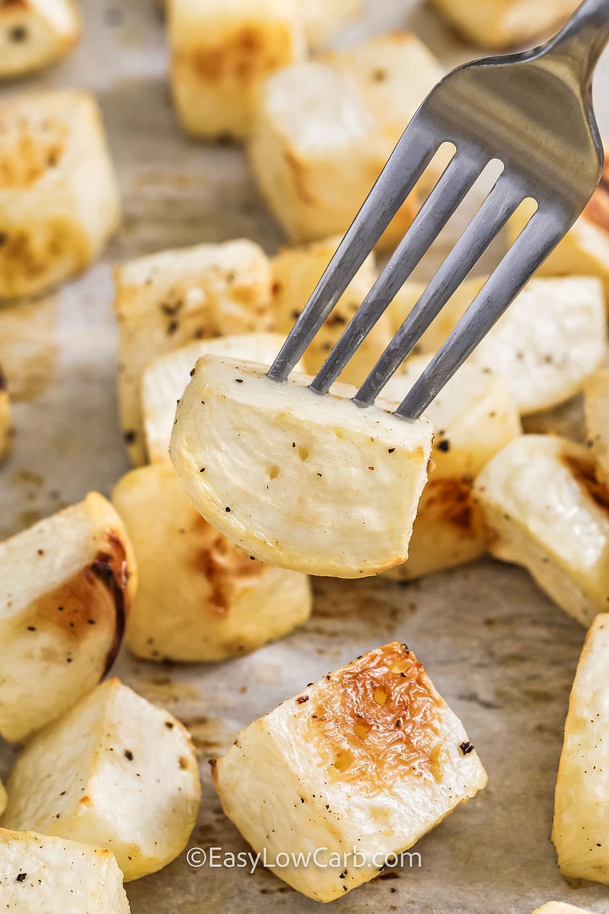 Roasted Turnips with a piece on a fork