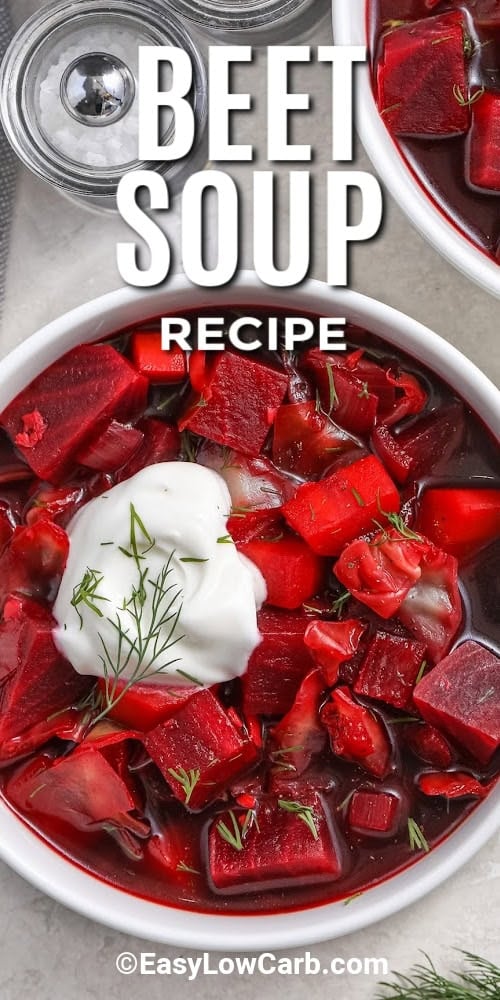 beet soup topped with sour cream in a bowl with a title