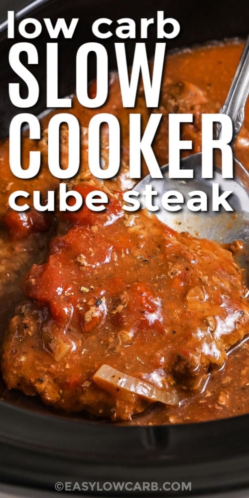 slow cooker cube steak with serving spoon with text