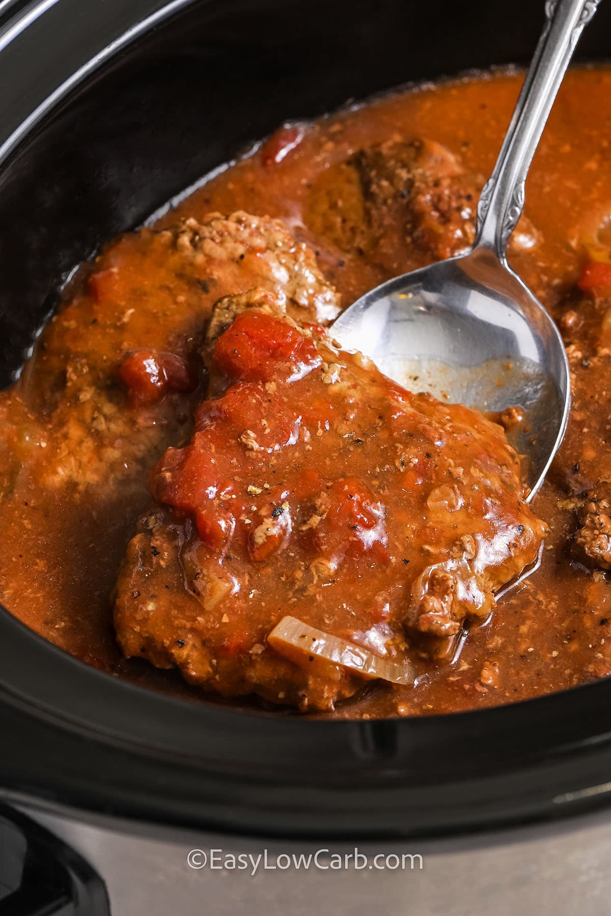 slow cooker cube steak bring served from a crock pot