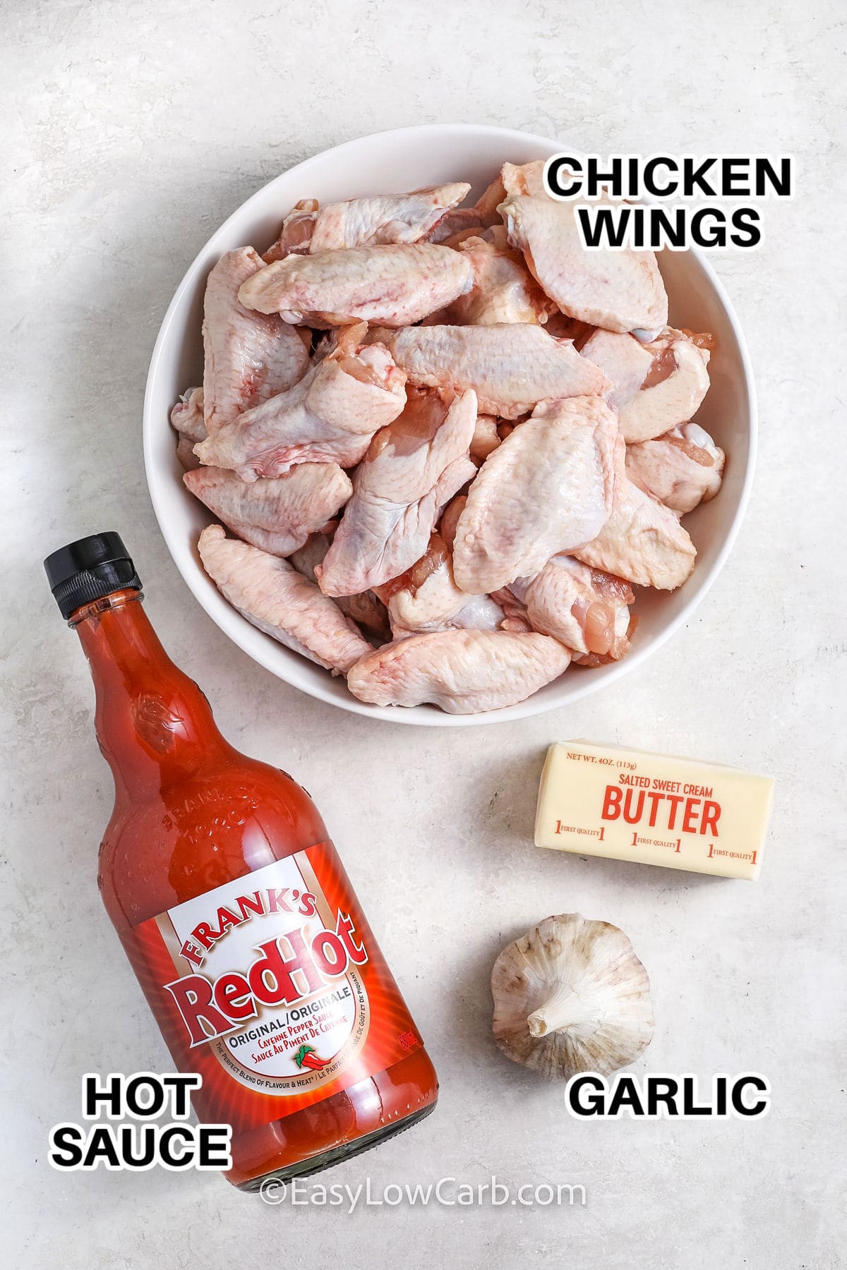 hot sauce , chicken wings , butter , garlic with labels to make Crockpot Chicken Wings