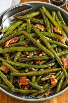 Slow Cooker Green Beans in a bowl with a fork and spoon