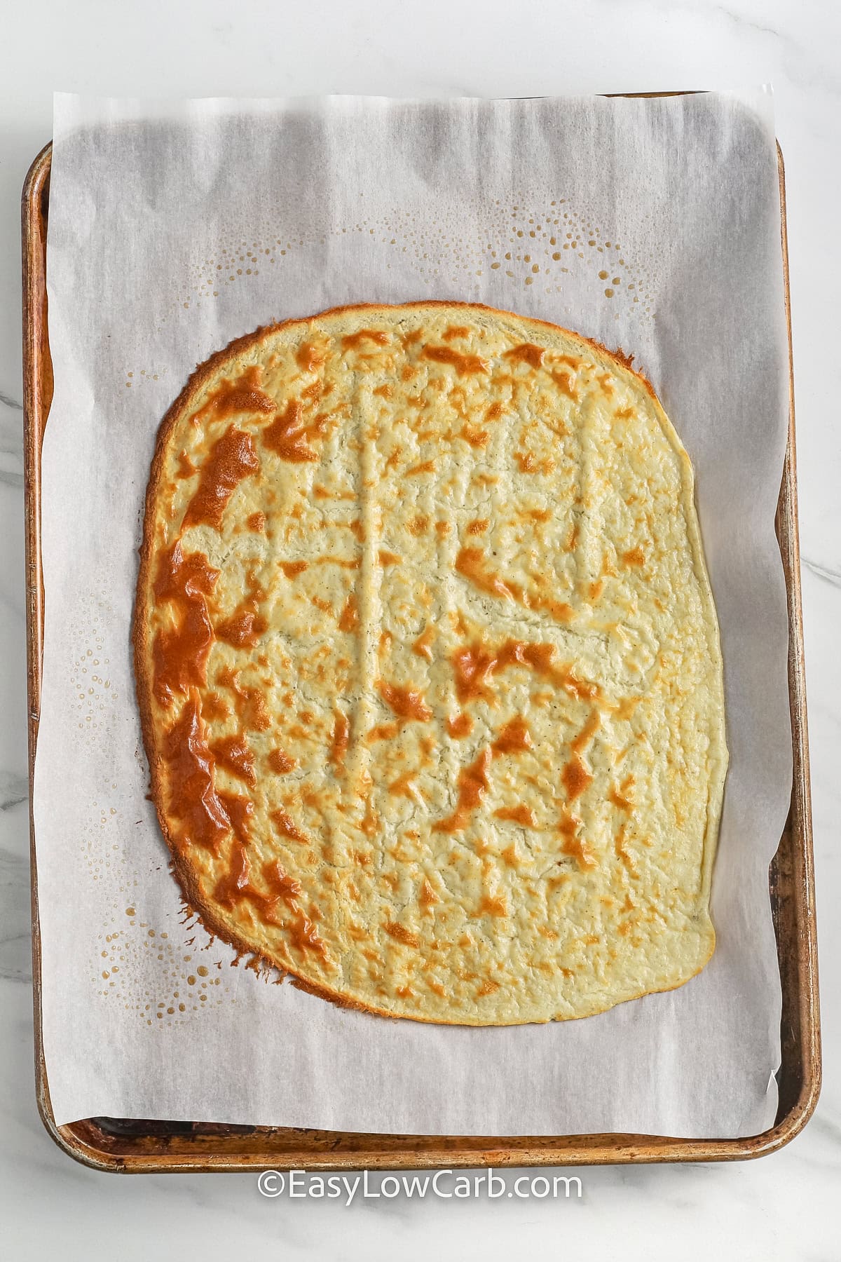 baked Cottage Cheese Flatbread on a sheet pan