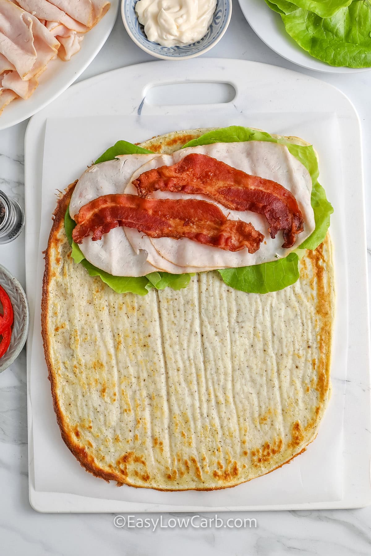 adding lettuce , turkey , bacon to a Cottage Cheese Flatbread