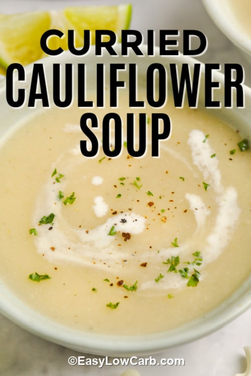 a bowl of Curried Cauliflower Soup garnished with chopped fresh parsley, with a title