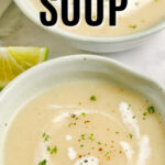 two bowls full of curried cauliflower soup, with a title