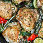 Lemon Rosemary Chicken with peppers and zucchini in a pan