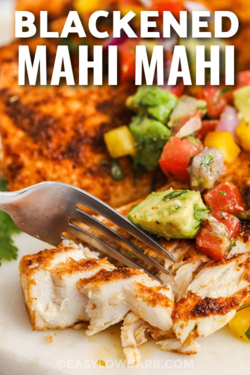 blackened mahi mahi and fork with text