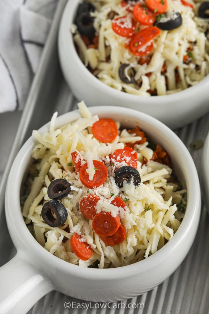 uncooked pizza bowls on a tray