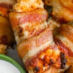 close up of Bacon Wrapped Jalapenos with a title