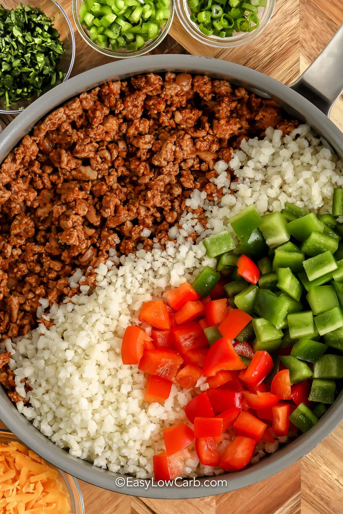 ingredients in a pan to make Cheesy Taco Skillet