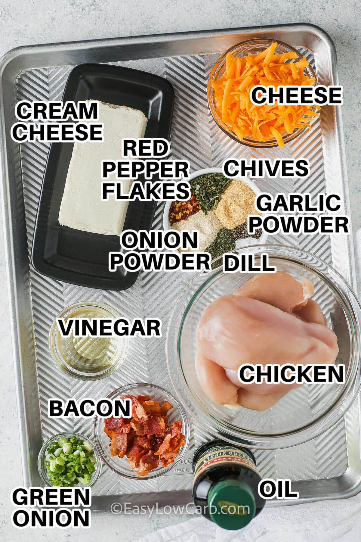 cheese, cream cheese , vinegar , bacon , chives , green onion , oil , chicken , dill , garlic powder , onion powder , red pepper glakes with labels to make Baked Chicken Crack Recipe