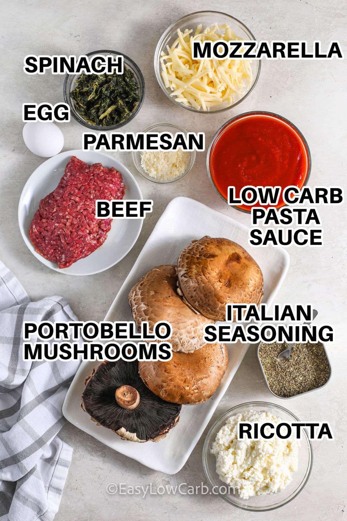 spinach , mozzarella , spinach , parmesan , low carb pasta sauce , italian seasoning , ricotta , portobello mushrooms with labels to make Lasagna Stuffed Mushrooms
