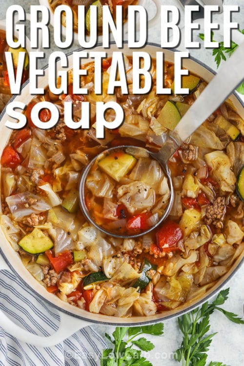 Ground Beef Vegetable Soup in the pot with a title