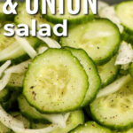 Close up of low-carb cucumber & onion salad, with writing