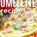 cheesy Denver Omelette recipe on a plate with writing