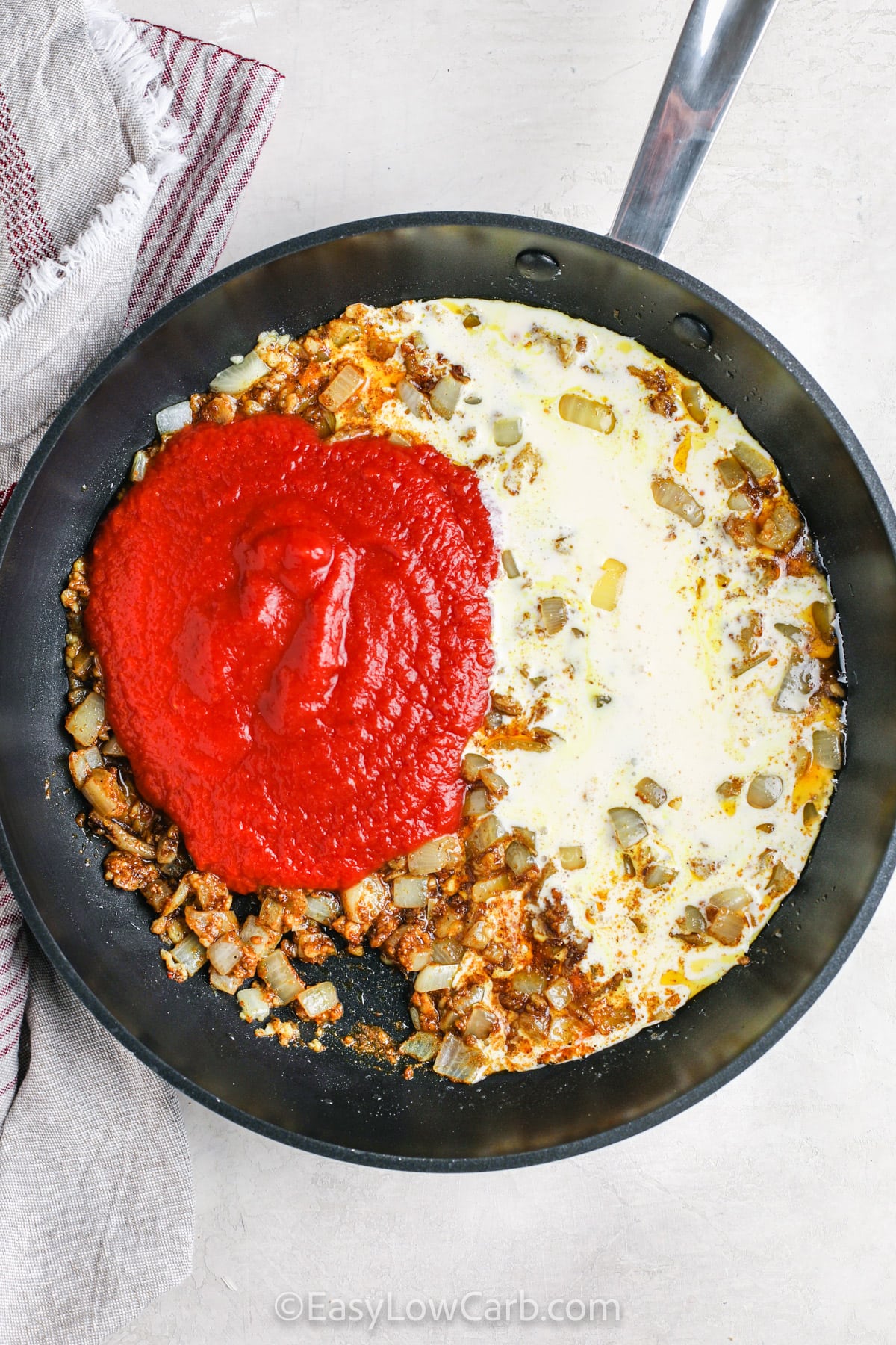 ketchup and cream added to pan
