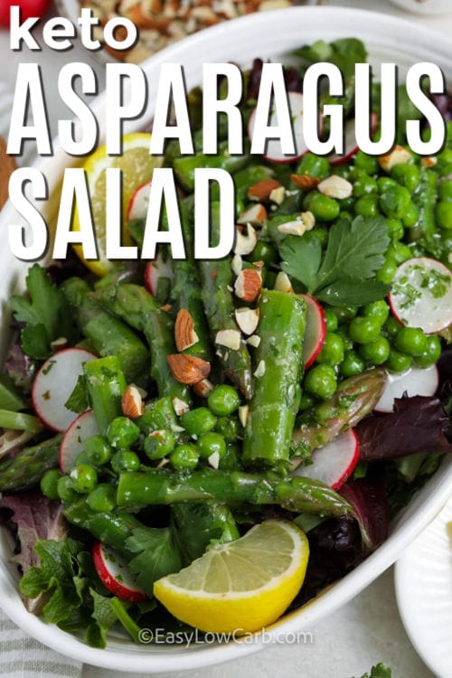 keto Asparagus Salad on a plate with writing