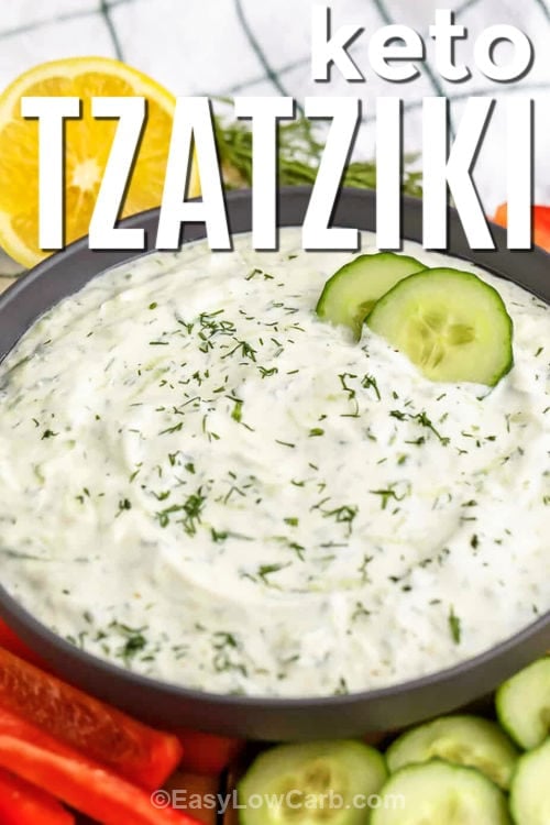 Homemade Tzatziki in a bowl with cucumber and veggies around it with a title