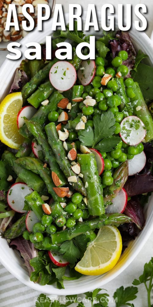 plated Asparagus Salad with lemon slices and a title