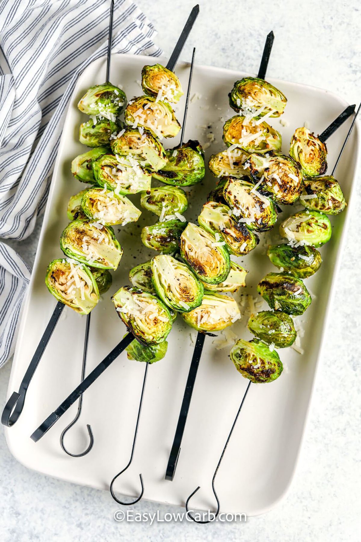plated Grilled Brussels Sprouts on skewers