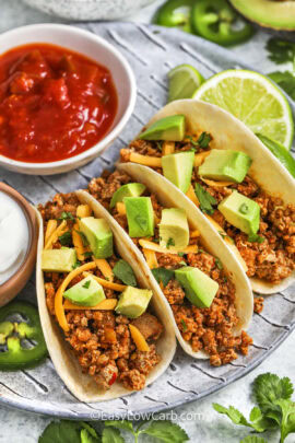 plated Ground Turkey Tacos with salsa and sour cream