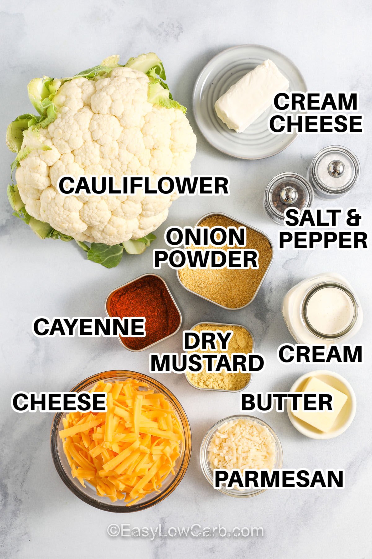 cauliflower , cream cheese , onion powder , cayenne , dry mustard , cheese , parmesan , butter , cream , salt and pepper with labels to make Cheesy Cauliflower Casserole
