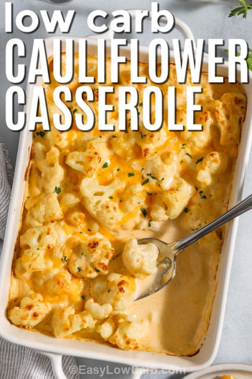 low carb Cheesy Cauliflower Casserole in the dish with a spoon and writing