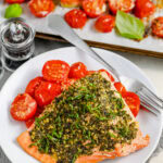 plated Pesto Salmon Recipe with sheet pan full