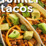 close up of Ground Turkey Tacos with avocado with writing